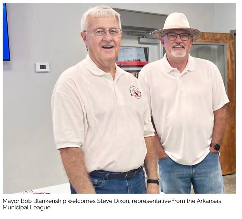 Mayor Bob Blankenship with Steve Dixon of the Arkansas Municipal League inside the new fire station